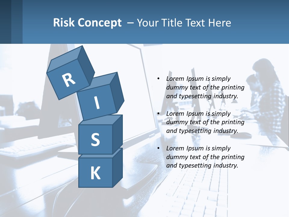 A Man Sitting In Front Of A Computer Monitor PowerPoint Template