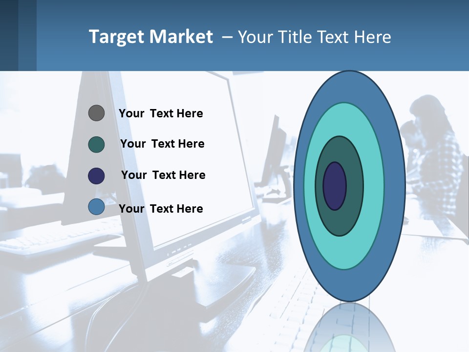 A Man Sitting In Front Of A Computer Monitor PowerPoint Template