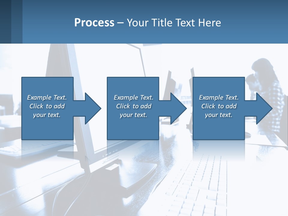 A Man Sitting In Front Of A Computer Monitor PowerPoint Template