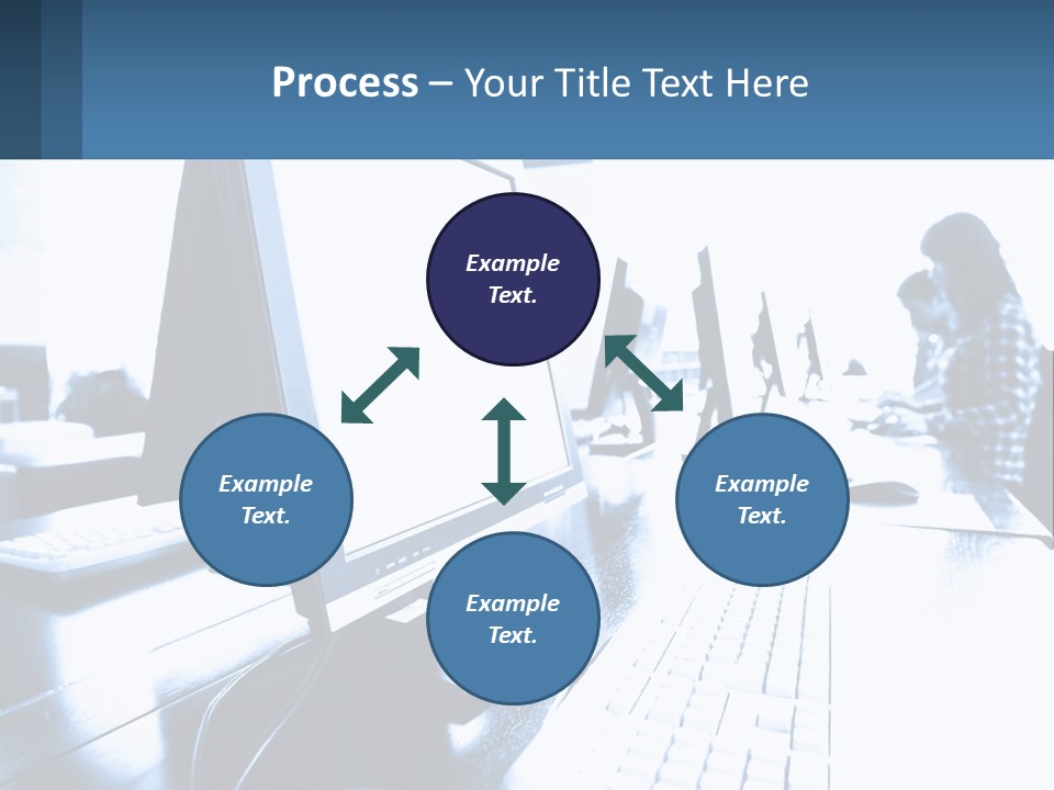 A Man Sitting In Front Of A Computer Monitor PowerPoint Template