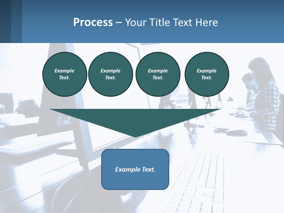 A Man Sitting In Front Of A Computer Monitor PowerPoint Template