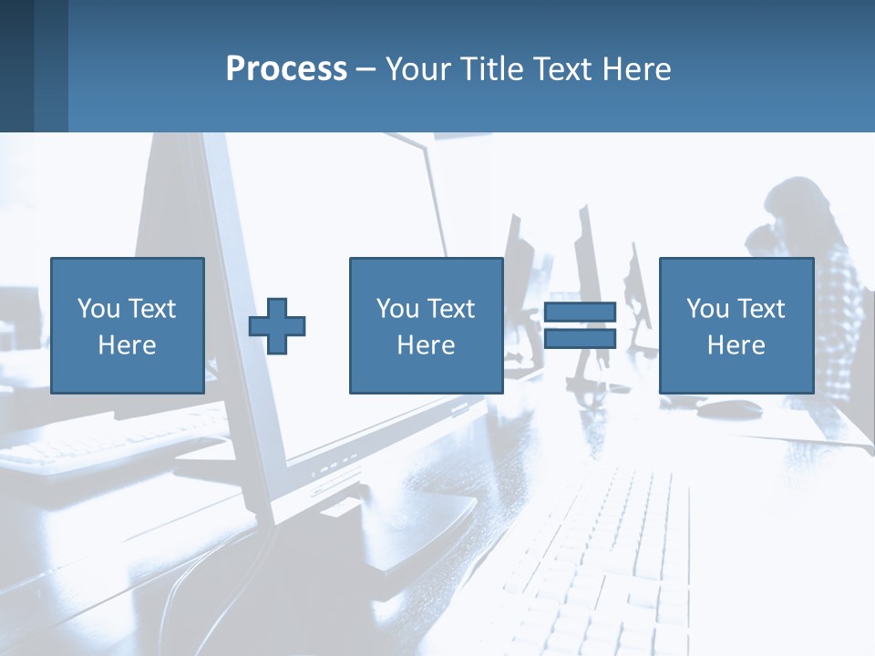 A Man Sitting In Front Of A Computer Monitor PowerPoint Template