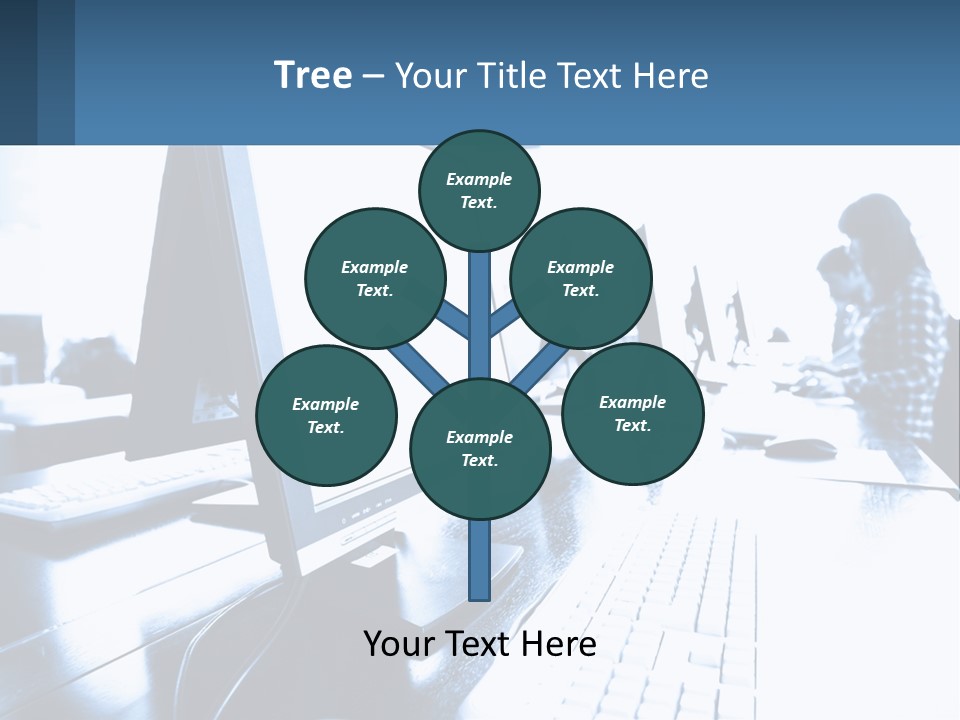 A Man Sitting In Front Of A Computer Monitor PowerPoint Template