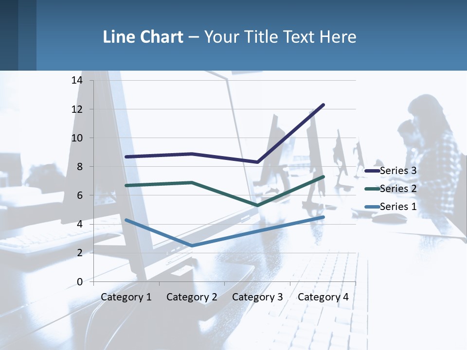 A Man Sitting In Front Of A Computer Monitor PowerPoint Template