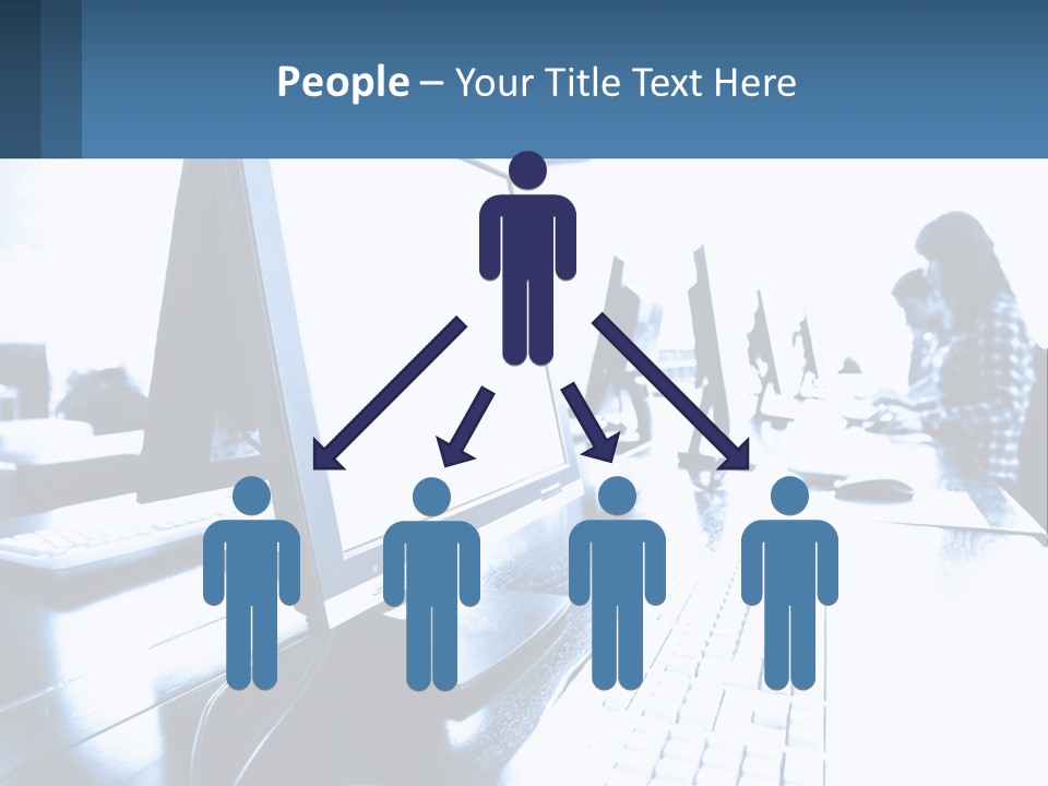 A Man Sitting In Front Of A Computer Monitor PowerPoint Template