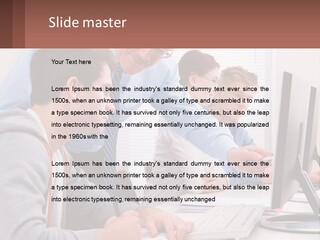 A Group Of People Working On A Computer PowerPoint Template