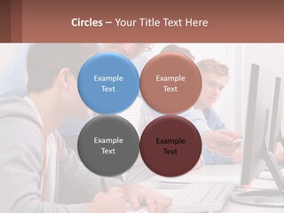 A Group Of People Working On A Computer PowerPoint Template