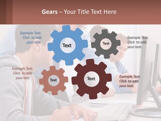 A Group Of People Working On A Computer PowerPoint Template