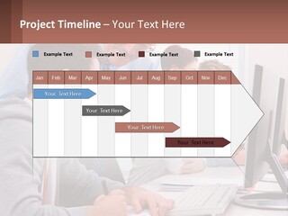 A Group Of People Working On A Computer PowerPoint Template