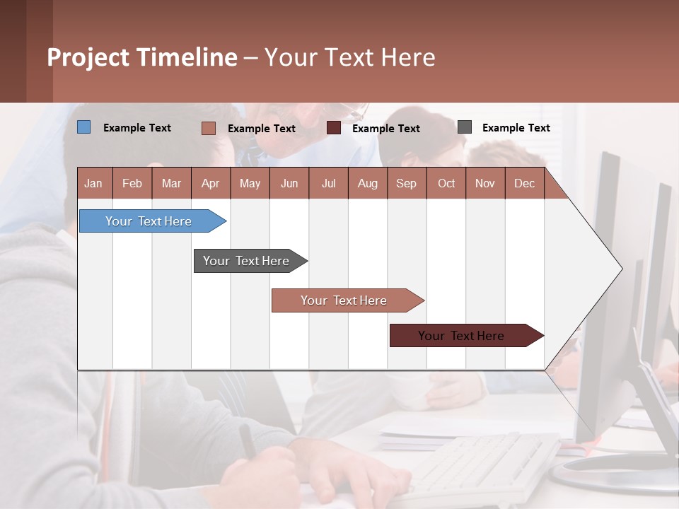 A Group Of People Working On A Computer PowerPoint Template