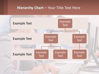 A Group Of People Working On A Computer PowerPoint Template
