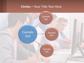 A Group Of People Working On A Computer PowerPoint Template