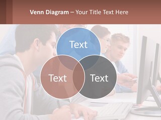 A Group Of People Working On A Computer PowerPoint Template