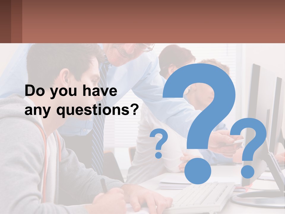 A Group Of People Working On A Computer PowerPoint Template