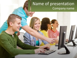 A Group Of People Sitting At A Computer Desk PowerPoint Template