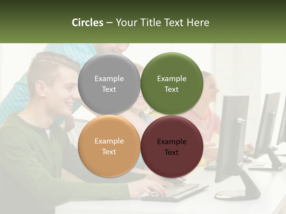 A Group Of People Sitting At A Computer Desk PowerPoint Template