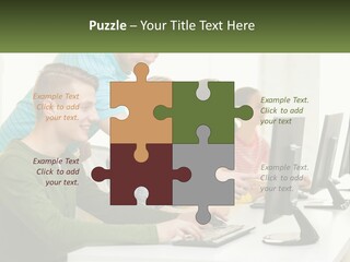 A Group Of People Sitting At A Computer Desk PowerPoint Template