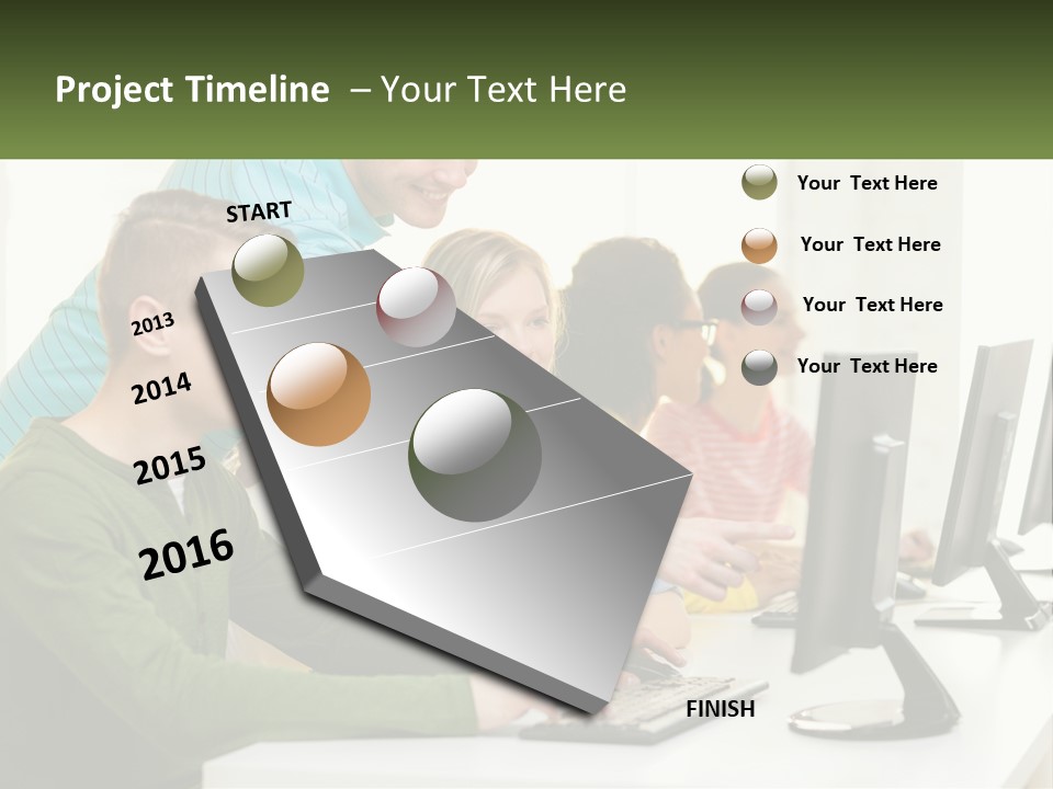 A Group Of People Sitting At A Computer Desk PowerPoint Template