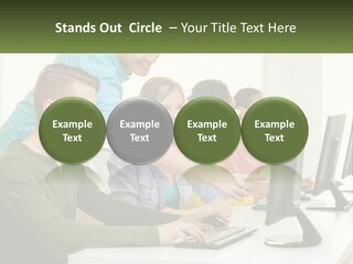 A Group Of People Sitting At A Computer Desk PowerPoint Template
