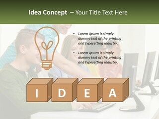 A Group Of People Sitting At A Computer Desk PowerPoint Template