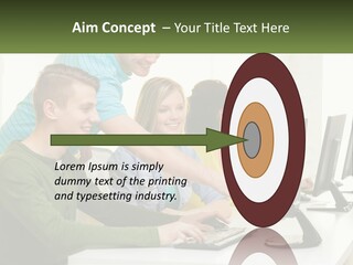 A Group Of People Sitting At A Computer Desk PowerPoint Template