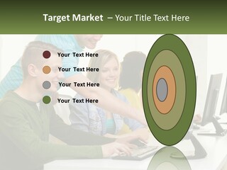 A Group Of People Sitting At A Computer Desk PowerPoint Template