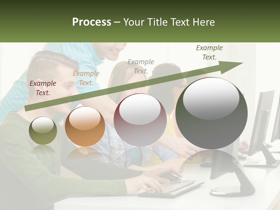 A Group Of People Sitting At A Computer Desk PowerPoint Template