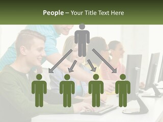 A Group Of People Sitting At A Computer Desk PowerPoint Template