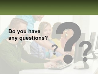 A Group Of People Sitting At A Computer Desk PowerPoint Template