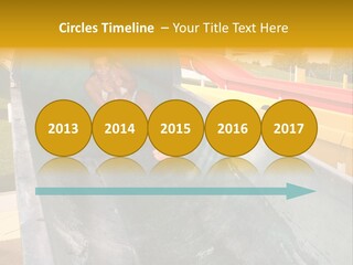 A Woman Slides Down A Slide In A Water Park PowerPoint Template