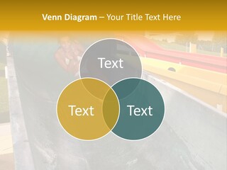 A Woman Slides Down A Slide In A Water Park PowerPoint Template