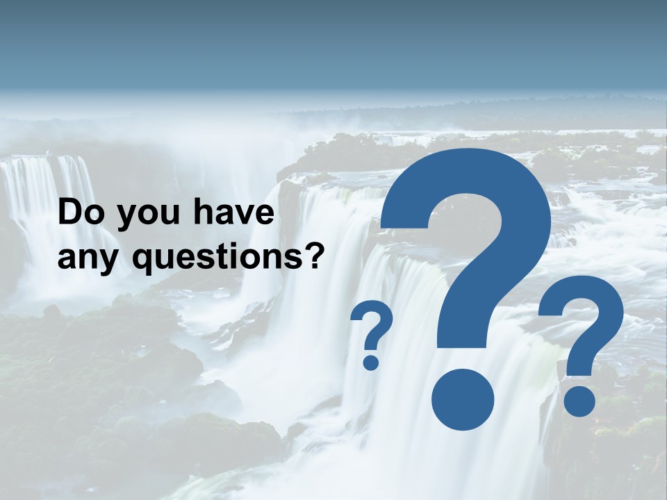 A Large Waterfall With Water Coming Out Of It PowerPoint Template