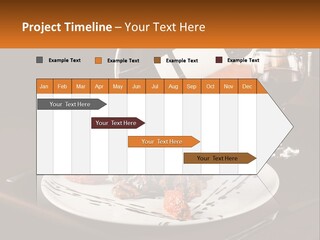 A Plate Of Food And A Glass Of Wine On A Table PowerPoint Template