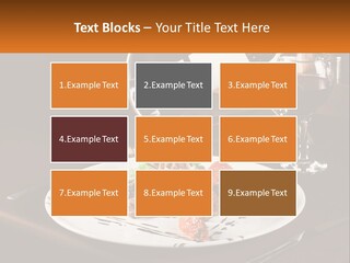 A Plate Of Food And A Glass Of Wine On A Table PowerPoint Template