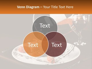A Plate Of Food And A Glass Of Wine On A Table PowerPoint Template