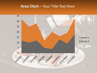 A Plate Of Food And A Glass Of Wine On A Table PowerPoint Template