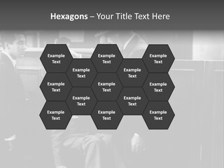 A Man Handing A Trophy To A Little Boy PowerPoint Template