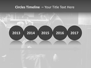 A Man Handing A Trophy To A Little Boy PowerPoint Template