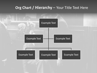 A Man Handing A Trophy To A Little Boy PowerPoint Template