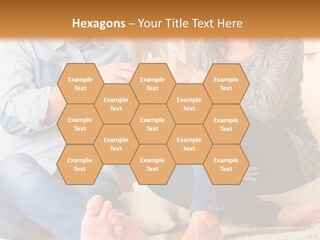A Man And A Woman Sitting On The Floor With Boxes In The Background PowerPoint Template