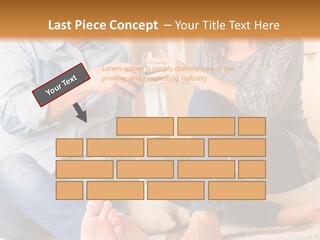 A Man And A Woman Sitting On The Floor With Boxes In The Background PowerPoint Template
