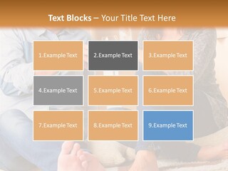 A Man And A Woman Sitting On The Floor With Boxes In The Background PowerPoint Template