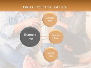 A Man And A Woman Sitting On The Floor With Boxes In The Background PowerPoint Template