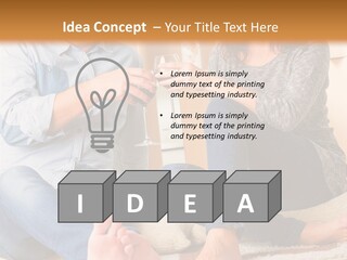A Man And A Woman Sitting On The Floor With Boxes In The Background PowerPoint Template