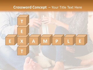 A Man And A Woman Sitting On The Floor With Boxes In The Background PowerPoint Template