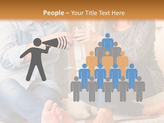 A Man And A Woman Sitting On The Floor With Boxes In The Background PowerPoint Template