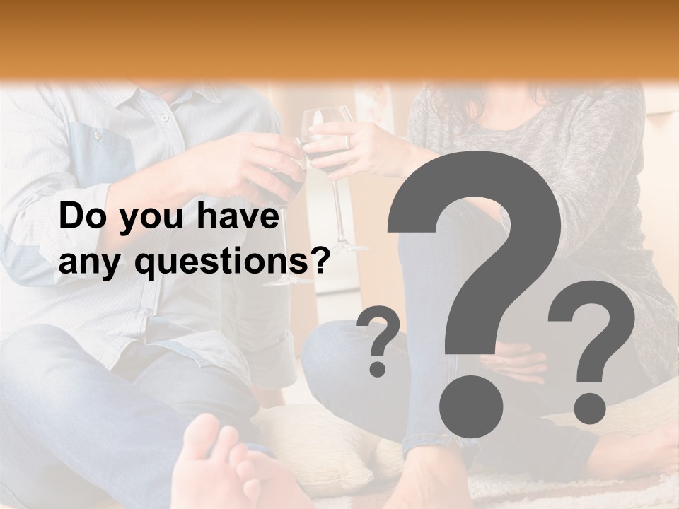 A Man And A Woman Sitting On The Floor With Boxes In The Background PowerPoint Template