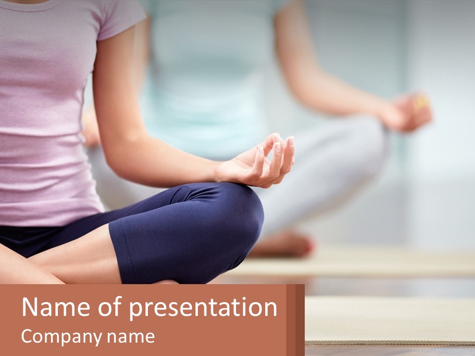 A Woman Sitting In A Yoga Position With Her Hands In The Air PowerPoint Template