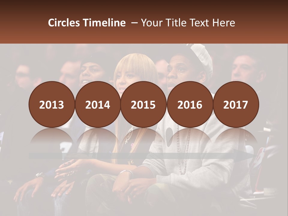 A Group Of People Sitting Next To Each Other PowerPoint Template