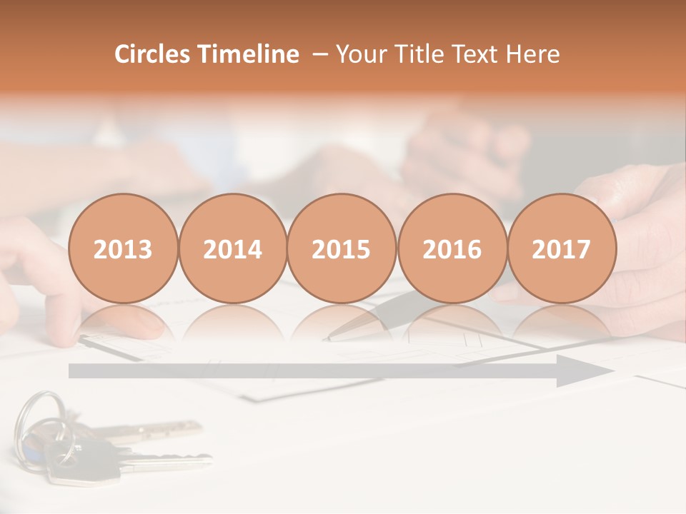 A Group Of People Sitting At A Table With A Pen And Paper PowerPoint Template